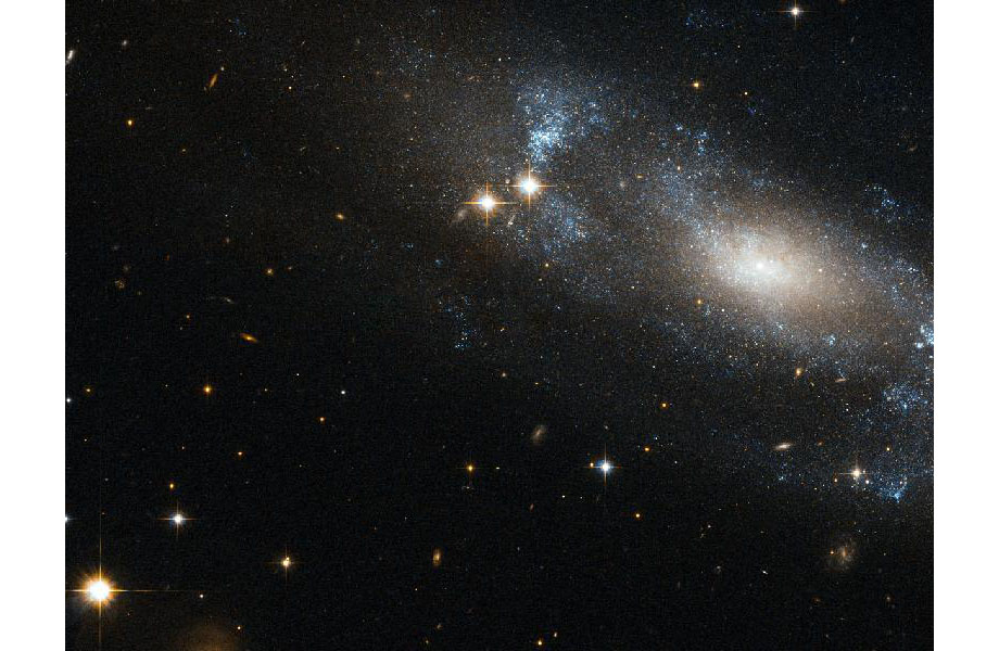 Fotó: "lötyögő" kékes spirálkarokat kapott le a Hubble