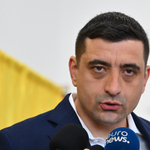 Mit üzen a magyaroknak, akik félnek öntől? - kérdezte a BBC George Simiont, a román elnökválasztási forduló győztesét